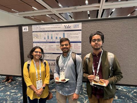 Abhishek Moitra (mid) presenting his paper at MLSys'25.